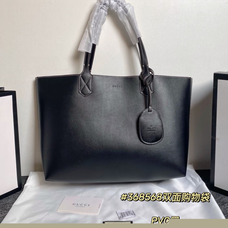 G*u*i shopping bags